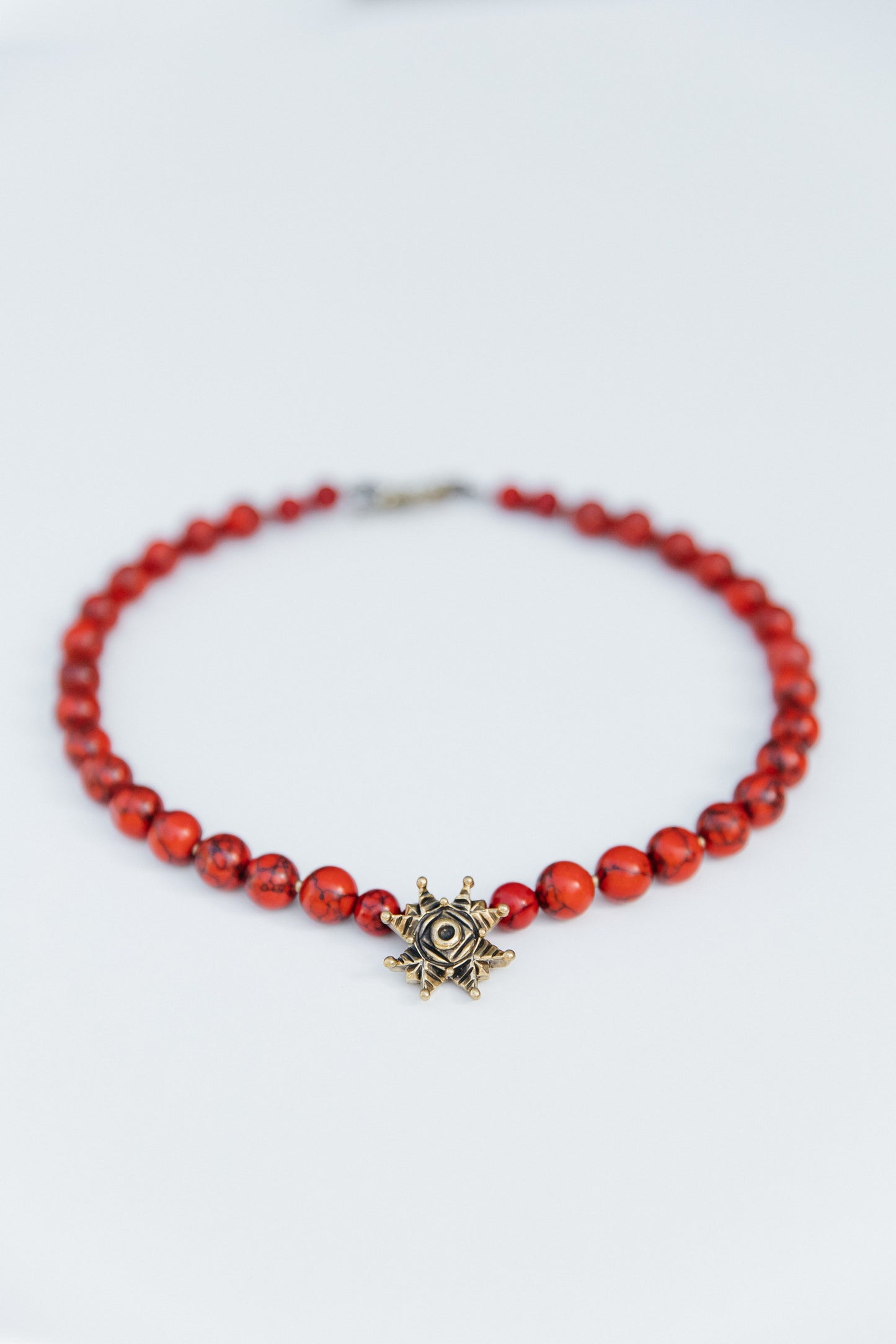 “Zori” Choker — Red Howlite Necklace with Bronze Star