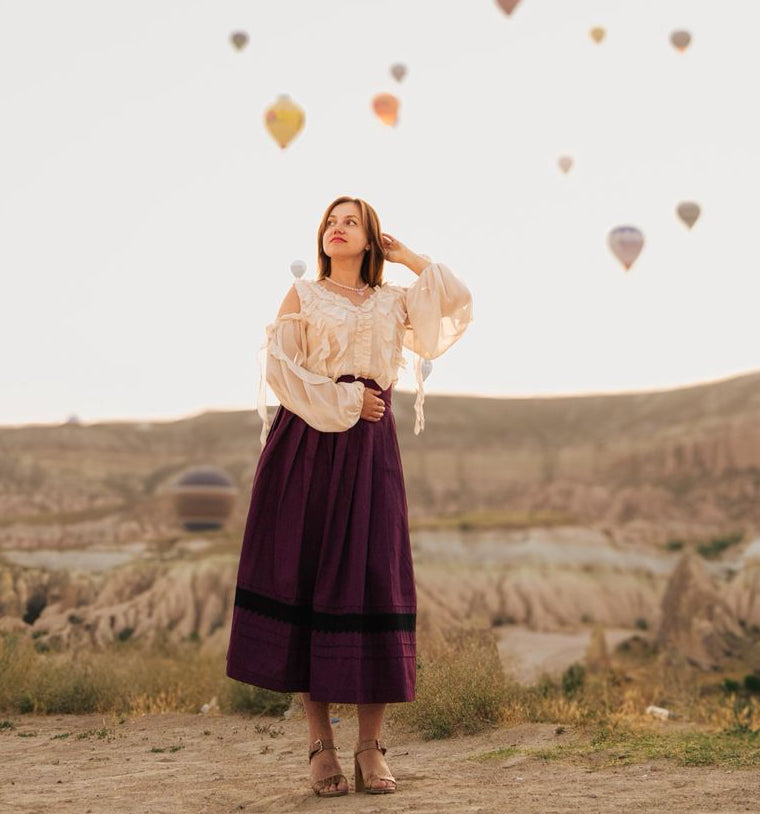 «Red Plum» midi skirt – A-line pleated polyviscose skirt with black lace trim and pintucks | Goya Concept