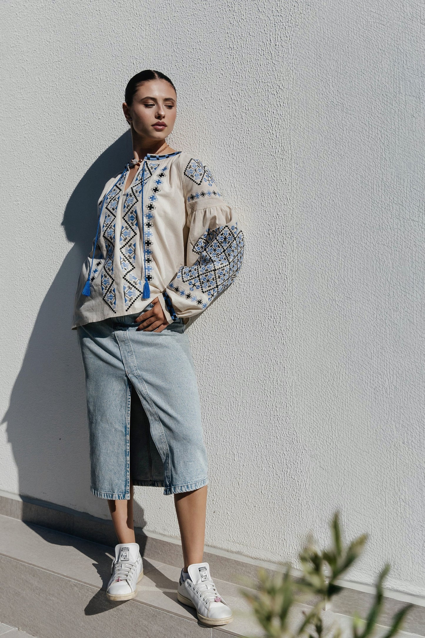 Blouse “Dyvotsvit” – Beige Linen Embroidered Blouse with Blue and Black Patterns and Tassels | Goya Concept