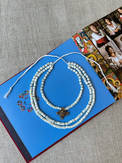 Three-Strand Mother-of-Pearl Necklace “Siaivo” — White Ukrainian Necklace with Dukach Pendant