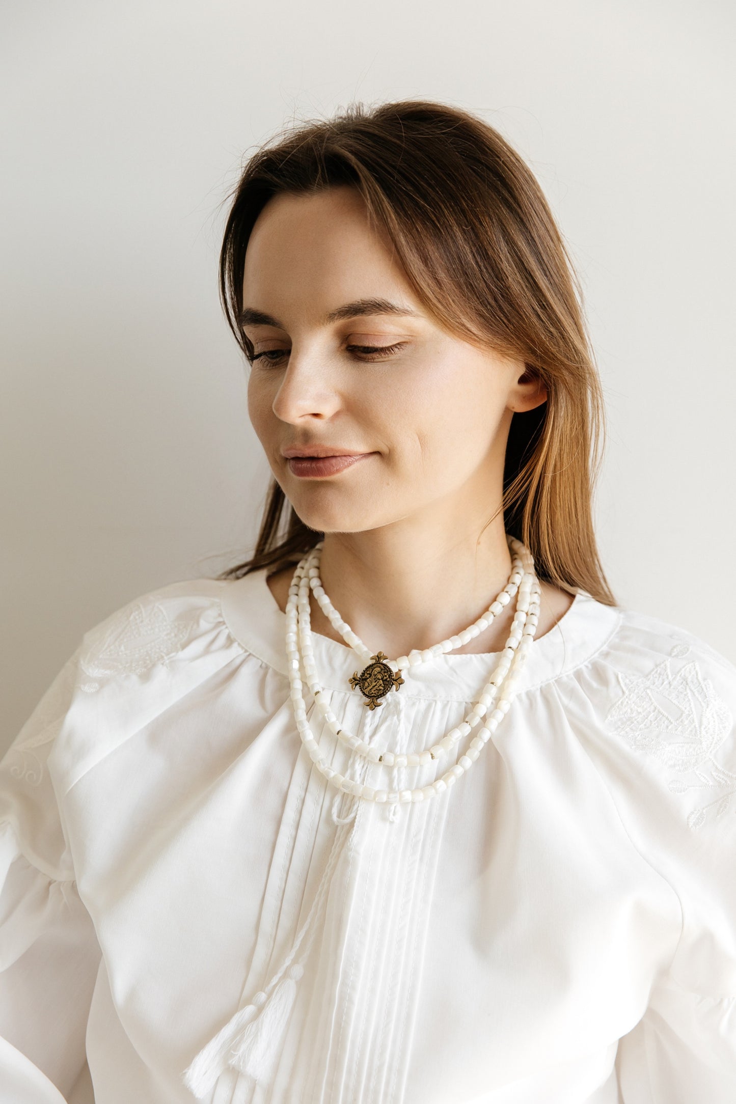 Three-Strand Mother-of-Pearl Necklace “Siaivo” — White Ukrainian Necklace with Dukach Pendant