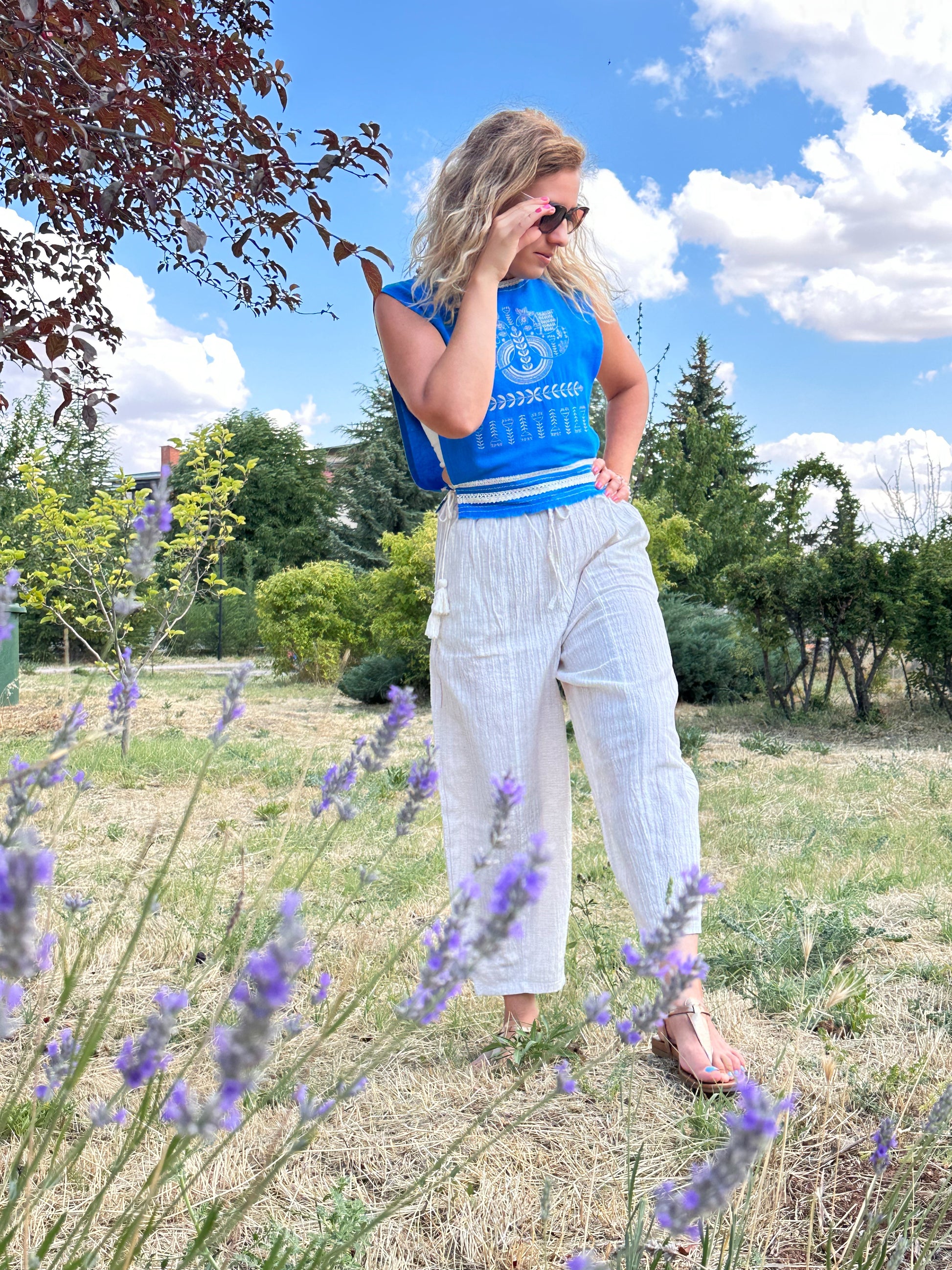     Women's blue side-tie vest with Ukrainian-inspired embroidery