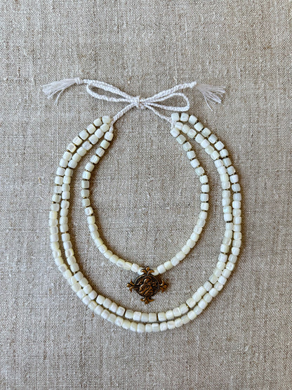 Three-Strand Mother-of-Pearl Necklace “Siaivo” — White Ukrainian Necklace with Dukach Pendant