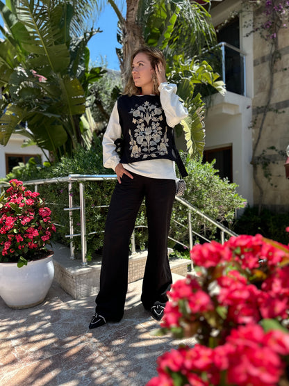     Women's black sleeveless top with Ukrainian-inspired embroidery