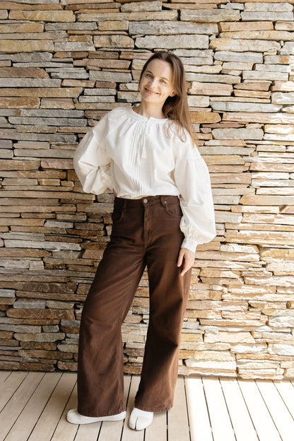White Embroidered Blouse “Lileya” with Voluminous Sleeves and Vertical Pleated Panel