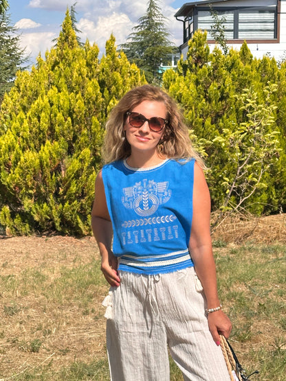     Blue embroidered side-tie top with handmade tassels