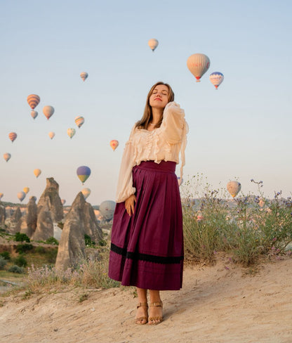 «Red Plum» midi skirt – A-line pleated polyviscose skirt with black lace trim and pintucks | Goya Concept