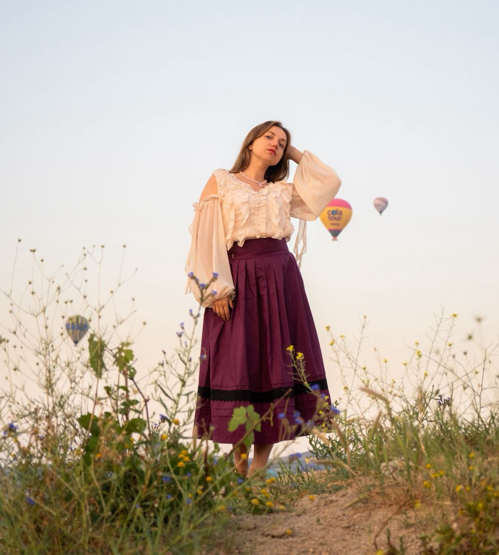 «Red Plum» midi skirt – A-line pleated polyviscose skirt with black lace trim and pintucks | Goya Concept
